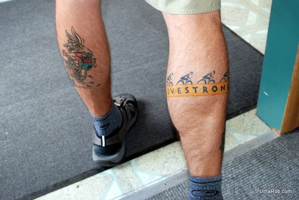 You get a Livestrong tattoo on the back of his calf.