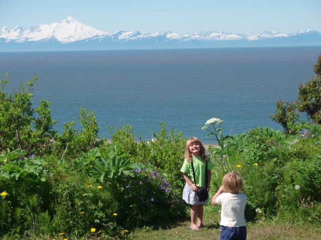 Cassidy Taking a Picture of Danielle and Mt ILiamna