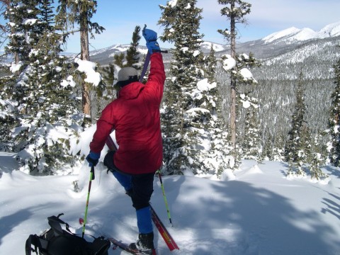 Tom Taking Climbing Skin Off with His Ski Still On